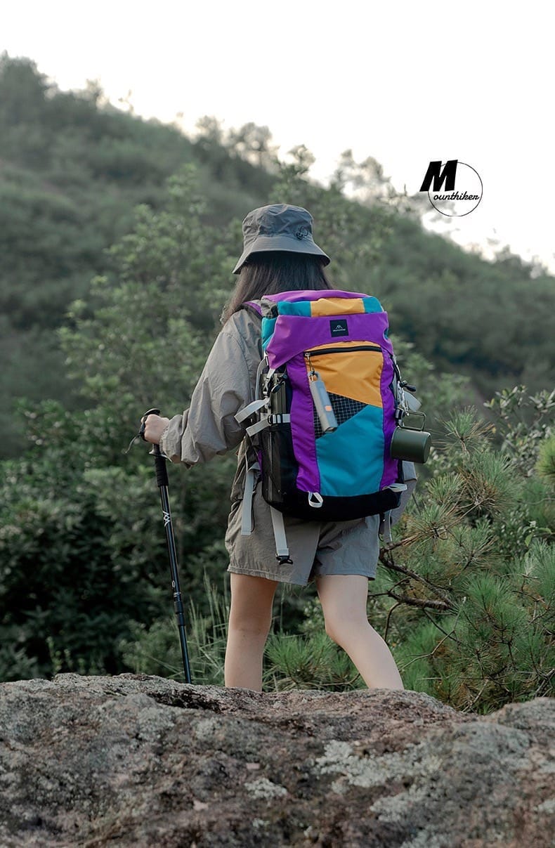 กระเป๋าเดินป่ากลางแจ้ง 35L  MOUNTAINHIKER สีม่วงฟ้า